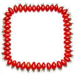 Obraz premium frame of red tomatoes isolated on a white background