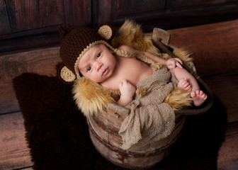 Alert Newborn Baby Boy Wearing a Monkey Hat