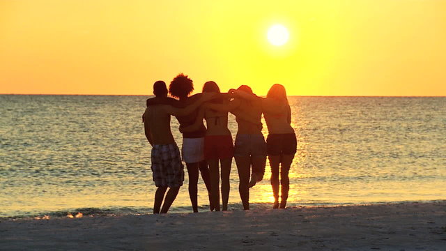 Carefree Young People Beach Vacation Sunset