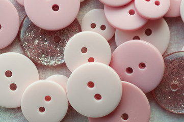 Close-up of assorted pink buttons