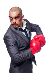 Badly beaten businessman with boxing gloves