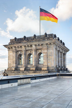 Reichstag in Berlin, with german flag