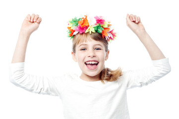 Excited charming kid raising her arms up