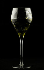 Wine glass with yellow potion