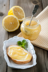 Homemade lemon curd with fresh lemons