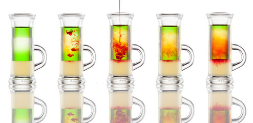 Multi-layered alcohol shot isolated on white