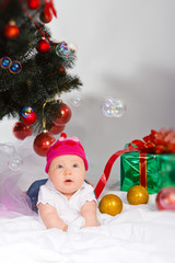 Fototapeta na wymiar baby with xmas decoration