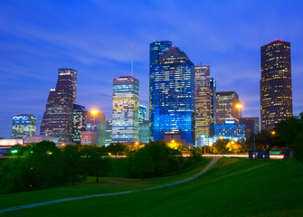 Houston Texas modern skyline at sunset twilight from park