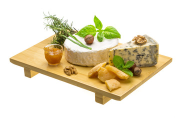 Assorted cheese - brie, dor blue and hard old yellow cheese