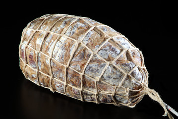 sausage on black background