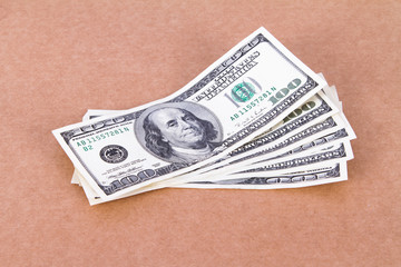 Dollar Bills on Cork Board