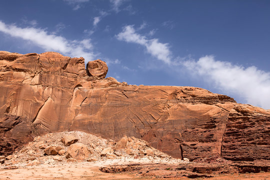 A Wadi Rum mountain with unusual rolling stone on it