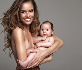 Portrait of smiling mother with child