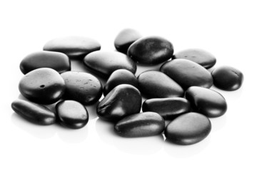 Black massage stones isolated