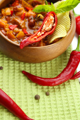 Chili Corn Carne - traditional mexican food, in wooden bowl,