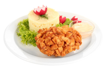 Chicken Kiev on croutons with mashed potatoes, isolated on