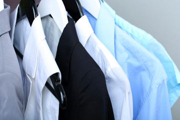 Clothes on circle hanger on light background