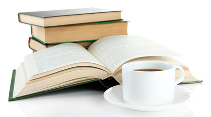 Cup of coffee and books isolated on white