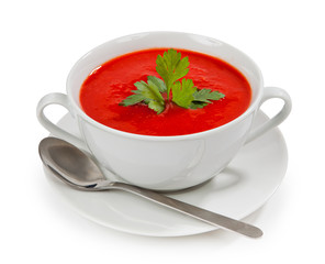 Tasty and healthy tomato soup isolated on white background