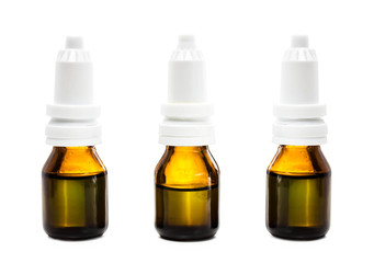 Three Amber dropper  bottles with oil, medicine or other benefic