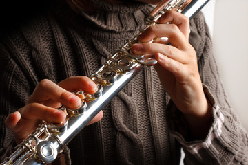 Girl playing flute © ultrapro