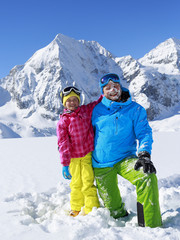 Ski, winter, snow and fun - family enjoying winter