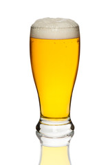 Glass of tasty and fresh beer isolated on a white background