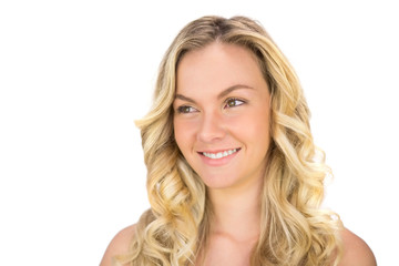Naklejka premium Cheerful curly haired blonde posing