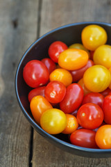 Fresh juicy Heirloom tomatoes in rustic setting