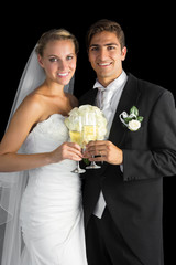 Content married couple posing holding champagne glasses