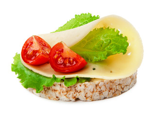Concept diet - cheese lettuce and tomato on a rice wafer