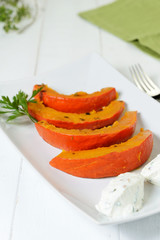 Plate of  baked pumpkin slices