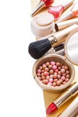 Makeup brush and cosmetics, on a white background isolated