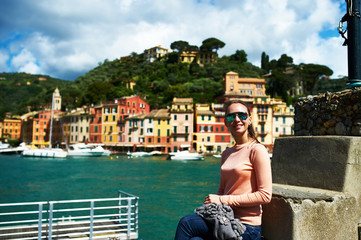 Naklejka premium Woman at Portofino village on Ligurian coast, Italy