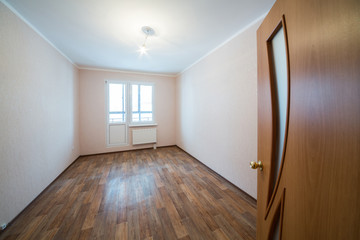 Fototapeta premium An empty unfurnished room residential apartment