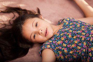 Naklejka premium Cute little girl resting