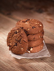 Tasty cookies on a wooden table. dramatic light