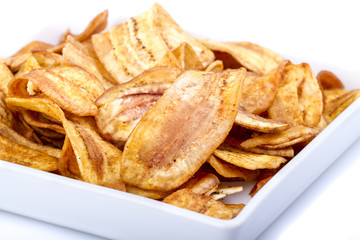 Crispy banana chip on white dish