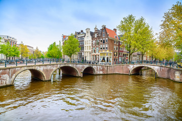 Naklejka premium Amsterdam. Bridge and water canal. Holland or Netherlands.