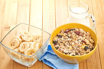 Delicious and healthy cereal in bowl with milk