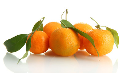 Ripe sweet tangerines with leaves, isolated on white