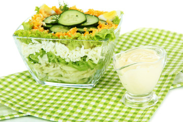 Delicious salad with eggs, cabbage and cucumbers, isolated