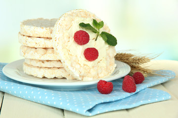 Tasty crispbread with berries, on white table