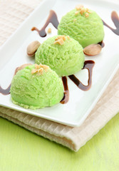 Delicious ice cream on plate on table close-up