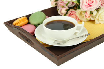 Coffee and macaroons on tray isolated on white