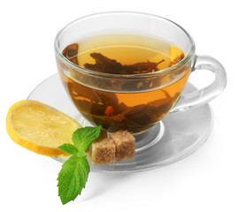 Transparent cup of green tea with lemon and mint isolated