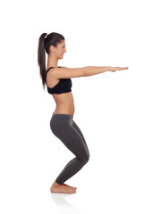Fototapeta na wymiar Woman doing exercises in a gym