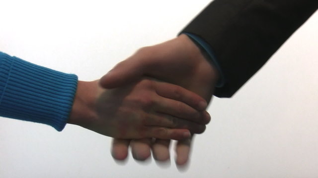 Isolated shot of male and female hand shaking
