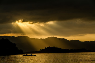 Sunset on the beach with mountains and sunray, Philippines