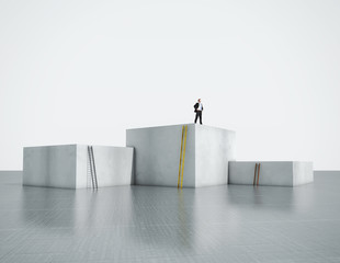 man standing on highest cube